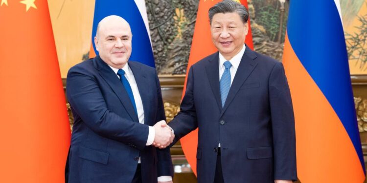 Chinese President Xi Jinping meets with Prime Minister of the Russian Federation Mikhail Mishustin in Beijing, capital of China, Dec. 20, 2023. (Xinhua/Huang Jingwen)