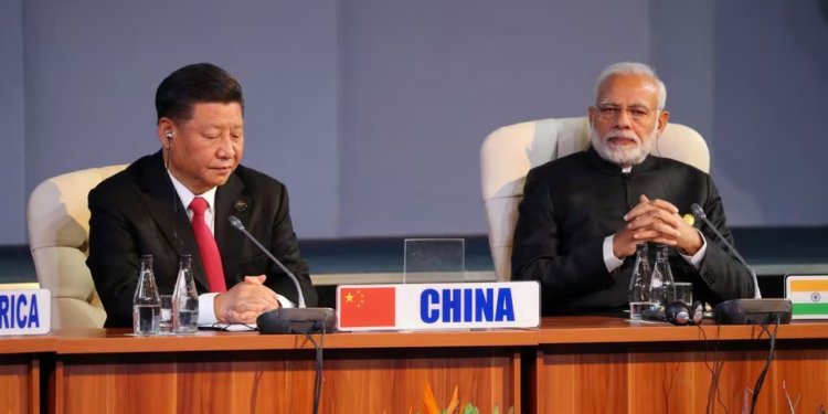 Indian Prime Minister Narendra Modi and China's President Xi Jinping attend a BRICS summit meeting in Johannesburg, South Africa, July 27, 2018. REUTERS/Mike Hutchings/File Photo