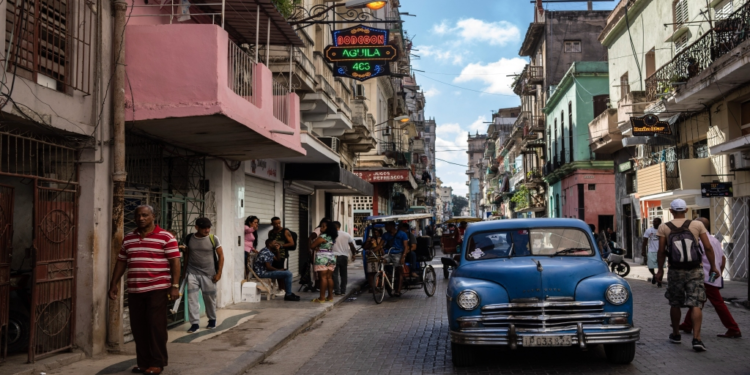 FILE - An American classic car makes its way down a street in Havana, Cuba, Nov. 11, 2023. (AP Photo/Ramon Espinosa, File)