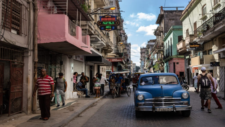 FILE - An American classic car makes its way down a street in Havana, Cuba, Nov. 11, 2023. (AP Photo/Ramon Espinosa, File)