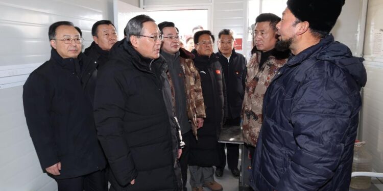 Chinese premier Li Qiang, also a member of the Standing Committee of the Political Bureau of the Communist Party of China Central Committee, talks with people affected by an earthquake in Chenjia Village of Dahejia Township, Jishishan County, northwest China's Gansu Province, Dec. 23, 2023. Li on Saturday visited several villages in Jishishan County, Gansu Province, and Minhe County in the neighboring Qinghai Province. A 6.2-magnitude earthquake struck the areas at 11:59 p.m. Monday. (Xinhua/Yao Dawei)