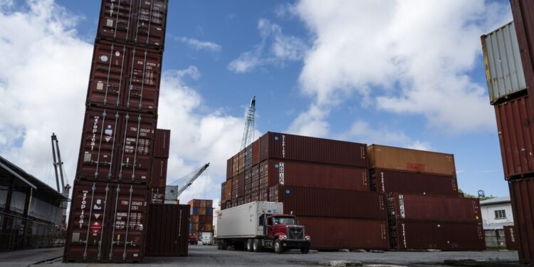 Shipping containers at Port Georgetown in Georgetown, Guyana.
Photographer: Eilon Paz/Bloomberg