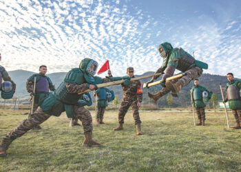 People's Armed Police Force soldiers engage in combat training in Hezhou, Guangxi Zhuang autonomous region, on Tuesday, as the Chinese military opened its annual training sessions. ZHANG BIHAI/FOR CHINA DAILY