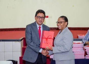 Minister of Legal Affairs and Attorney General, Mohabir Anil Nandlall SC, handing over of criminal bench books to Chief Justice (ag), Roxanne George Wiltshire