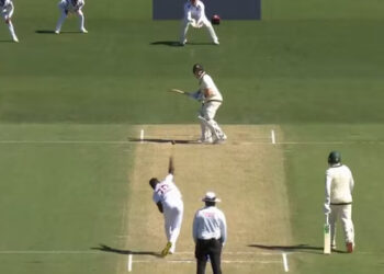 Shamar Joseph bowls his first ball to Steve Smith