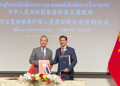 Chinese Foreign Minister Wang Yi (L) and his Thai counterpart Parnpree Bahiddha-Nukara at a signing ceremony of a mutual visa exemption agreement between China and Thailand in Bangkok, Thailand, January 28, 2024. /CGTN