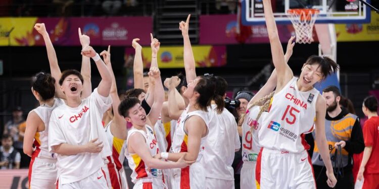 (231226) -- BEIJING, Dec. 26, 2023 (Xinhua) -- As the sporting calendar draws to a close, Xinhua News Agency has selected the top 10 Chinese athletes/teams for 2023:
3. China women's basketball team
China's women's basketball team dethroned Japan to win a classic final at the FIBA Women's Basketball Asia Cup in July. They defeated Japan again to defend their Asian Games title in October, the seventh time for them to be crowned in Asiad history.
This file photo taken on July 2, 2023 shows players of China celebrating after winning the final match against Japan at the 2023 FIBA Women's Asia Cup in Sydney, Australia. (Photo by Hu Jingchen/Xinhua)