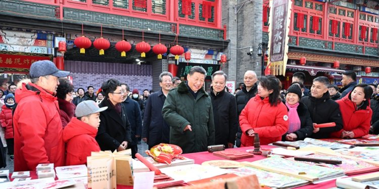 Chinese President Xi Jinping, also general secretary of the Communist Party of China Central Committee, visits people in the northern city of Tianjin ahead of the Spring Festival, February 1, 2024. /Xinhua