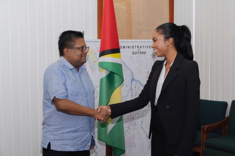 Finance Minister Dr. Ashni Singh and Reigning Miss World Guyana Andrea King