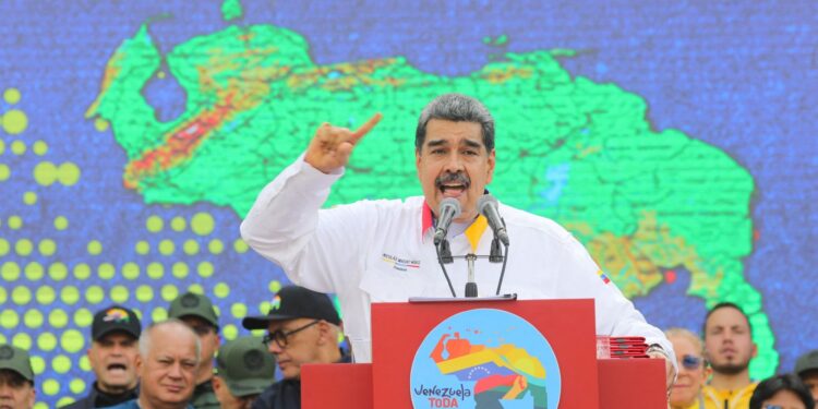 President Nicolás Maduro speaking in front of a new map of Venezuela that shows Guyana’s Essequibo region within Venezuela’s borders. MARCELO GARCIA/AGENCE FRANCE-PRESSE/GETTY IMAGES