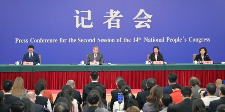 Chinese Foreign Minister Wang Yi, also a member of the Political Bureau of the Communist Party of China Central Committee, attends a press conference on China's foreign policy and foreign relations on the sidelines of the second session of the 14th National People's Congress (NPC) in Beijing, capital of China, March 7, 2024. (Xinhua/Cai Yang)