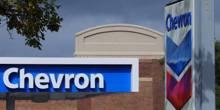 A Chevron gas station sign is seen in Austin, Texas, U.S., October 23, 2023. REUTERS/Brian Snyder/File Photo Purchase Licensing Rights