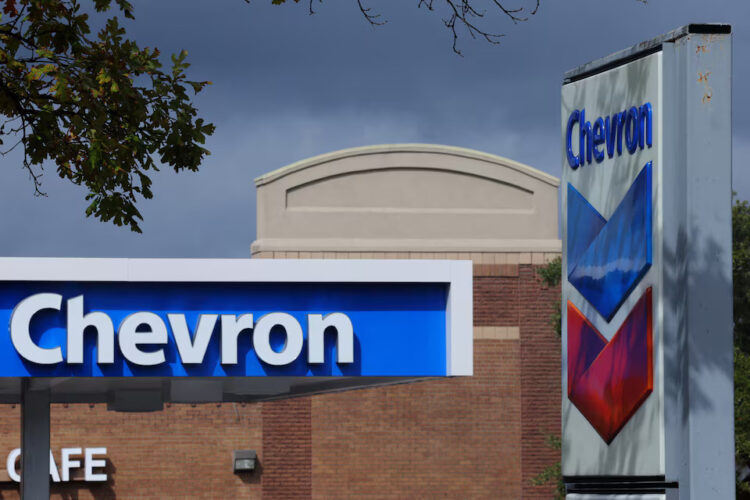 A Chevron gas station sign is seen in Austin, Texas, U.S., October 23, 2023. REUTERS/Brian Snyder/File Photo Purchase Licensing Rights