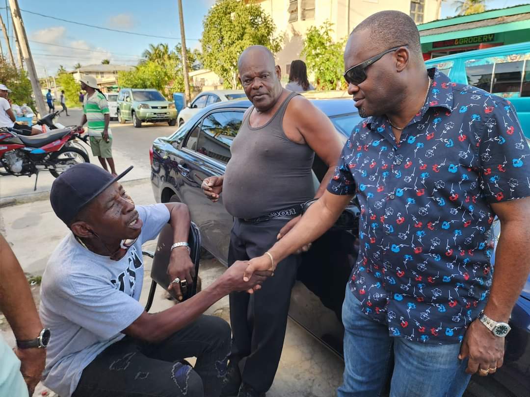 Roysdale Forde S.C, M.P (in figured shirt) interacting with East Ruimveldt residents, March 10, 2024