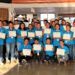 Participants at the Youth Climate Change Forum in Lethem pose with certificate of participation at the end of the three-day.