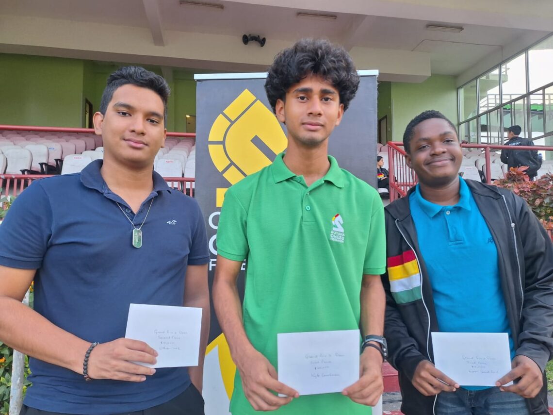 Open Category Grand Prix 3 Winners Kyle Couchman (C) First Place flanked by Ethan Lee (L) Second, and Keron Sandiford (R), Third.
