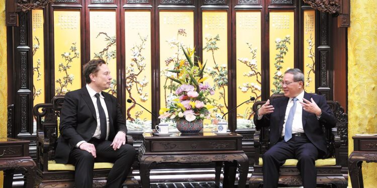Premier Li Qiang meets on Sunday with Elon Musk, founder and CEO of US electric car manufacturer Tesla, at Diaoyutai Guest House in Beijing. [FENG YONGBIN / CHINA DAILY]