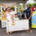 First Lady Arya Ali and her two sons Zayd and Ilan hand over a cheque for $1M to the representative of Fureva Hope Alive Animal Rescue Sanctuary after yesterday’s lemonade sale