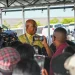 Minister of Public Works, Bishop Juan Edghill engaging vendors on the Kitty Sea Wall, Georgetown