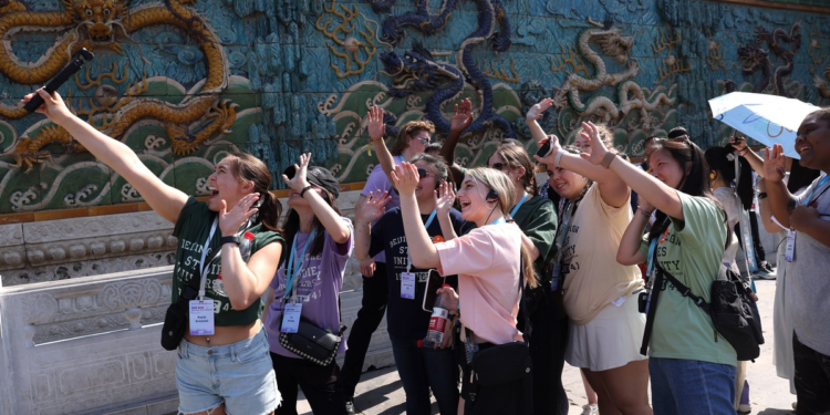 Students from Indiana University of Pennsylvania in the United States visit the Forbidden City in Beijing on May 17, 2024. [Photo by Zou Hong/China Daily]