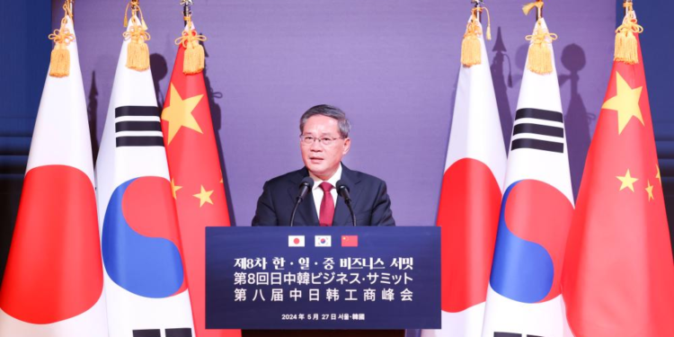 Chinese Premier Li Qiang speaks at the eighth business summit among China, Japan and South Korea, in Seoul, South Korea, May 27, 2024. Li attended the business summit with South Korean President Yoon Suk-yeol and Japanese Prime Minister Fumio Kishida on Monday. (Xinhua/Pang Xinglei)