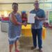 From Left_ Yolanda James, President, Eddie's Home and President of the Roteract Club Peter Pompey