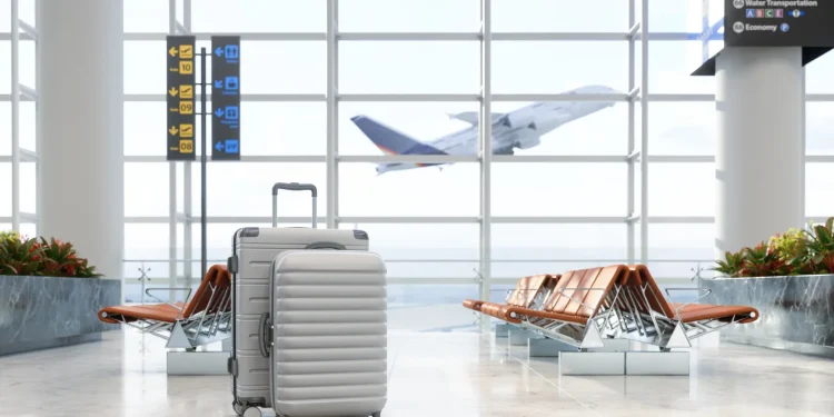 Airport waiting area with luggage.Getty