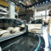 People watch a vehicle at the booth of Skyworth Auto at the 2024 Beijing International Automotive Exhibition in Beijing, China, April 30, 2024.