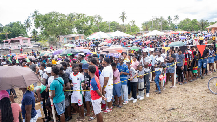 Part of the crowd in Linden who benefited from the footwear distribution on May 18, 2028