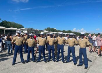 US Marines just after the Graduation Ceremony. Jeremy Fraser (Right), and Mikel Gaul (Second from right).