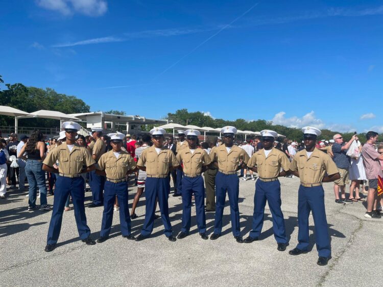US Marines just after the Graduation Ceremony. Jeremy Fraser (Right), and Mikel Gaul (Second from right).