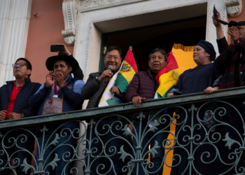 Bolivian President Luis Arce greets his supporters on a balcony of the government palace, La Paz, Bolivia, June 26, 2024. /CFP