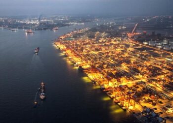 An aerial drone photo taken on May 9, 2024 shows the night view of Qinzhou Port in Qinzhou, south China's Guangxi Zhuang Autonomous Region. (Xinhua/Zhang Ailin)