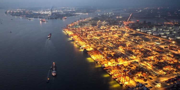 An aerial drone photo taken on May 9, 2024 shows the night view of Qinzhou Port in Qinzhou, south China's Guangxi Zhuang Autonomous Region. (Xinhua/Zhang Ailin)