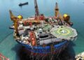 An aerial drone photo taken on April 26, 2024 shows Haikui No. 1, Asia's first cylindrical floating, production, storage, and offloading (FPSO) facility, in Qingdao, east China's Shandong Province. (Xinhua/Li Ziheng)