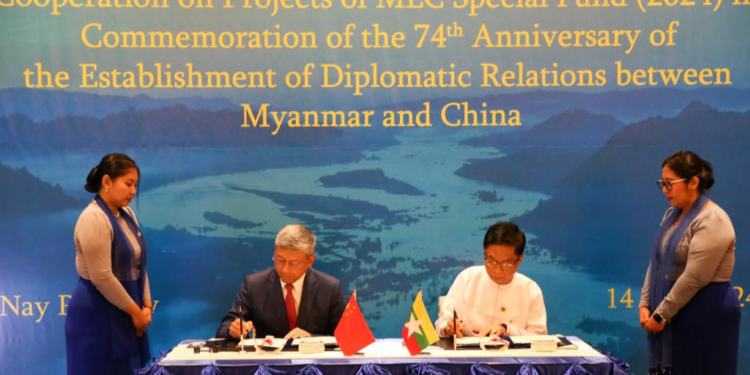 Chinese Ambassador to Myanmar Chen Hai (L) and Myanmar's Deputy Minister for Foreign Affairs U Lwin Oo (R) sign an agreement on cooperation projects of Lancang-Mekong Cooperation (LMC) Special Fund 2024 in Nay Pyi Taw, Myanmar, June 14, 2024. /Xinhua
