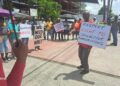 Union leaders protest in solidarity with teachers, in front of the Ministry of Education, June 6, 2024 (center GTUC President Norris Witter)