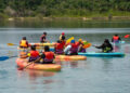 Persons participating in kayaking