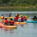 Persons participating in kayaking