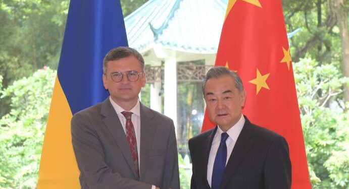Chinese Foreign Minister Wang Yi, also a member of the Political Bureau of the Communist Party of China Central Committee, holds talks with Ukrainian Foreign Minister Dmytro Kuleba in Guangzhou, south China's Guangdong Province, July 24, 2024. (Xinhua/Lu Hanxin