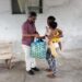 IFAAD Vice Chairman former Mayor Pt Ubraj Narine distribute hamper and farming tool to a Kuru Kururu resident