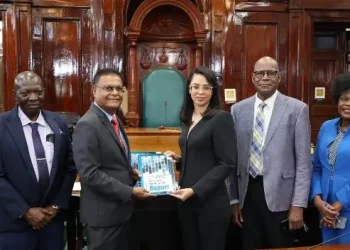 Pauline Chase, PPC  Chairman handing over the report to Speaker Manzoor Nadir