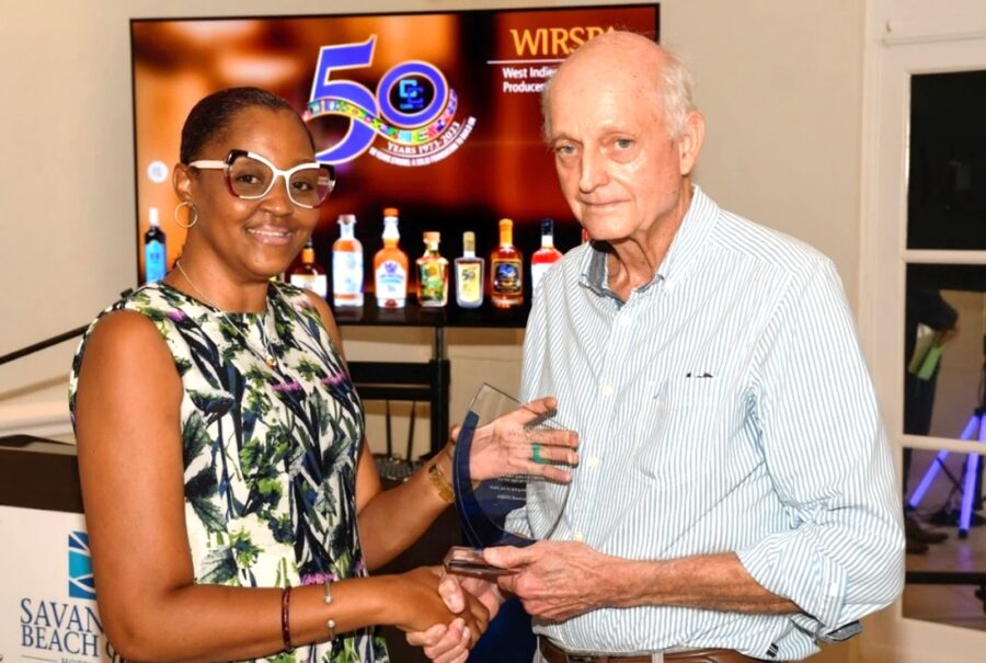 WIRSPA-Office-Manager-Carolann-John-presenting-Rhett-Harris-with-his-award