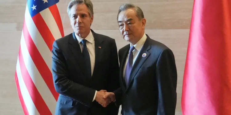 US Secretary of State Antony Blinken shakes hands with Chinese counterpart Wang Yi on the sideline of the ASEAN foreign ministers' meeting in Vientiane, Laos, on July 27, 2024. Achmad Ibrahim/AP