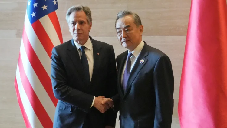 US Secretary of State Antony Blinken shakes hands with Chinese counterpart Wang Yi on the sideline of the ASEAN foreign ministers' meeting in Vientiane, Laos, on July 27, 2024. Achmad Ibrahim/AP