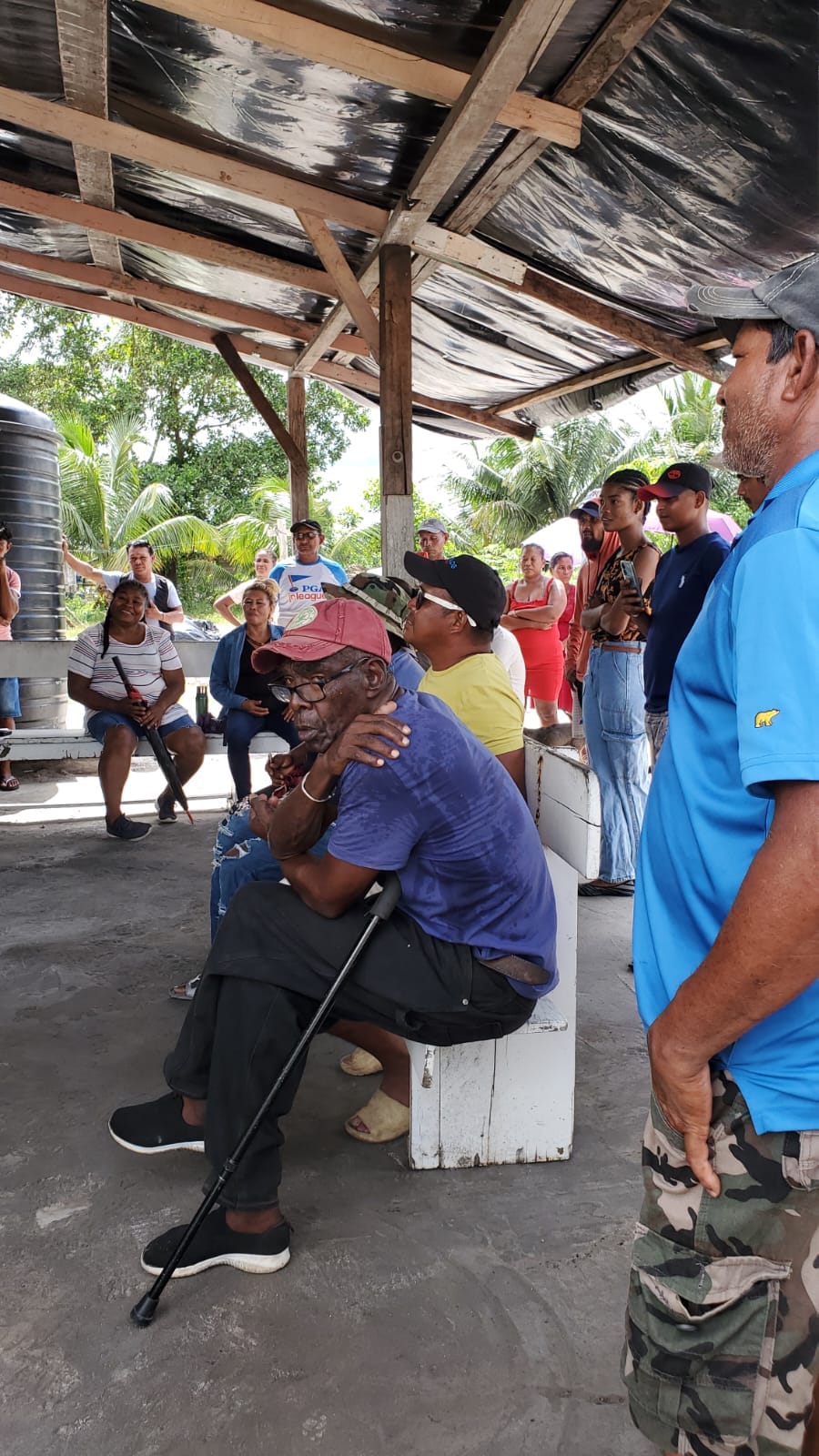 Residents of Kuru Kururu listening to IFAAD leaders