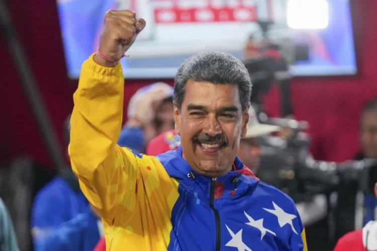 President Nicolas Maduro addresses supporters after electoral authorities declared him the winner of the presidential election in Caracas, Venezuela on Monday.
Fernando Vergara/AP