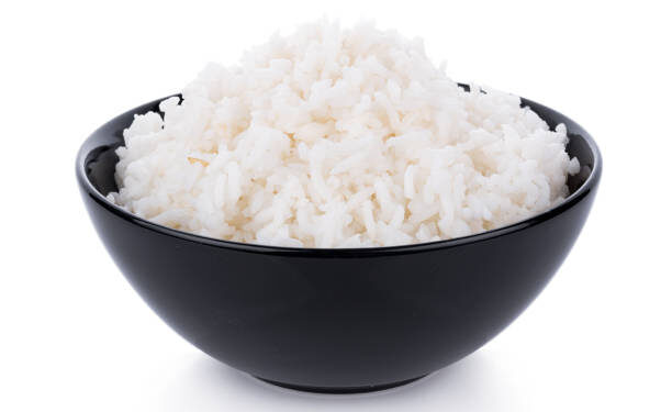Rice in a bowl on a white background