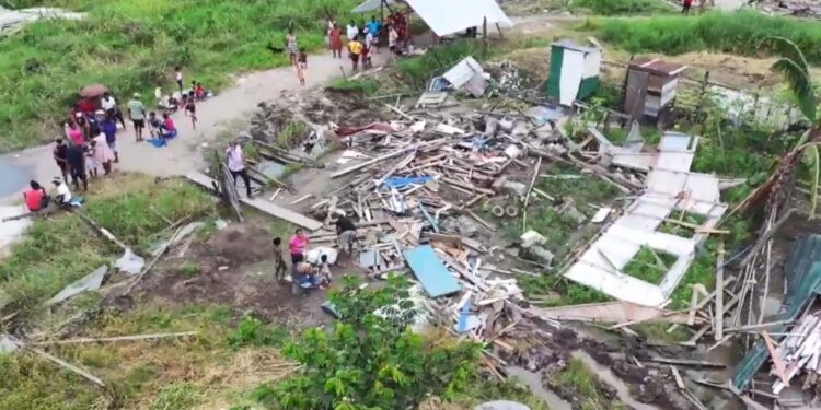 Displaced residents of Sarah Johanna looking on at what's left of their homes which was demolished Friday under the watchful eyes of the police (July 2024)