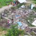 Displaced residents of Sarah Johanna looking on at what's left of their homes which was demolished Friday under the watchful eyes of the police (July 2024)